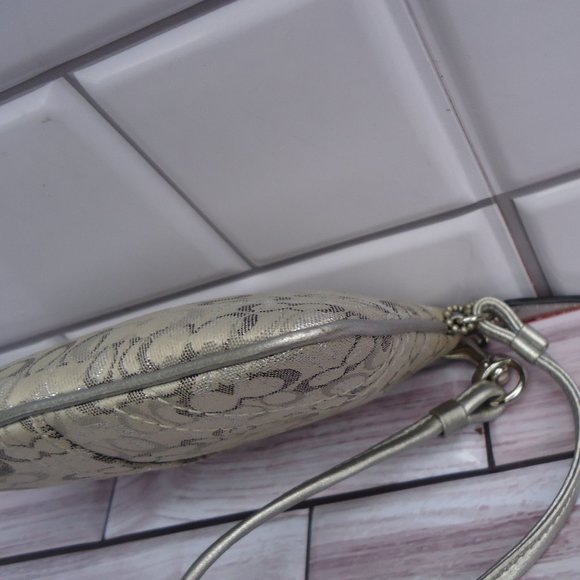 Coach wristlet with classic signature print canvas. - Picture 6 of 16